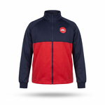 A colorblock zip-up track jacket with a navy blue upper section and sleeves, a red lower body panel, and a small red circular logo on the left chest, shown on a white background with a drop shadow.