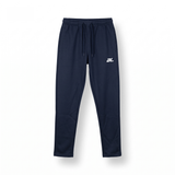 A pair of navy blue sweatpants with a white 'AL' logo on the left thigh, displayed against a clean white background.