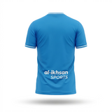 A bright blue short-sleeve athletic jersey shown from the back, featuring white trim on the collar and sleeve cuffs, with 'al-ikhsan SPORTS' printed in white across the lower back. The jersey is presented on a clean white background with a soft drop shadow.