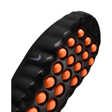 Black Nike Mind 001 men slipper outsole with orange circular traction pods