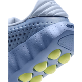 Close up of blue Nike Mind 002 training shoe heel with yellow traction pods