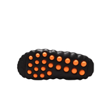 Black Nike Mind 001 women slipper outsole with orange circular traction pods
