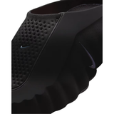 Close up of black Nike Mind 001 women slipper featuring perforated upper and Nike swoosh logo