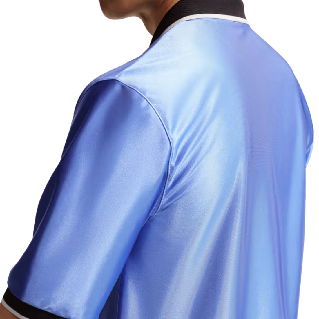 Close-up back view of a person wearing a shiny light blue satin or silky short-sleeve top with a black collar and black sleeve trim against a white background.