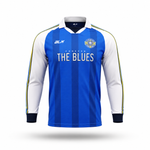 A long-sleeve soccer jersey with vertical blue stripes, white sleeves, and yellow piping details. The front features the text 'FOREVER THE BLUES' and a crest, with the brand 'ALX' on the right chest.