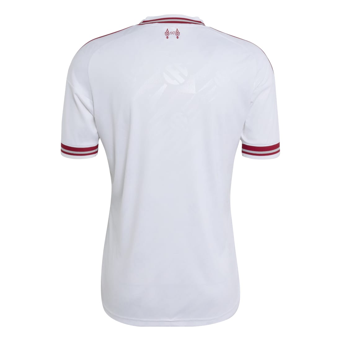 White short-sleeve soccer jersey shown from the back, featuring thin red stripes on the collar and sleeve cuffs, and a small red crest centered below the neckline.