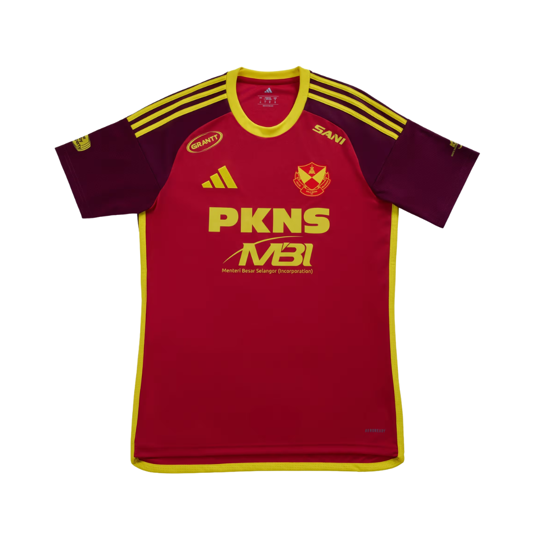 A red and maroon short-sleeve sports jersey with yellow trim, featuring the PKNS MBI logo on the front, an Adidas logo, and a team crest, displayed on a solid white background.