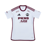 A white short-sleeve soccer jersey with maroon trim, featuring the PKNS and MBI logos on the front, the Adidas logo, and the AKS logo. The jersey is displayed flat against a solid white background.